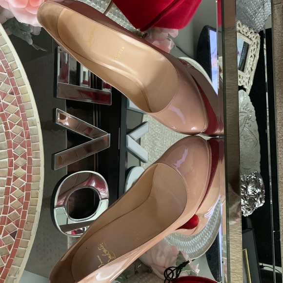 Christian Louboutin - Picture 1 of 4